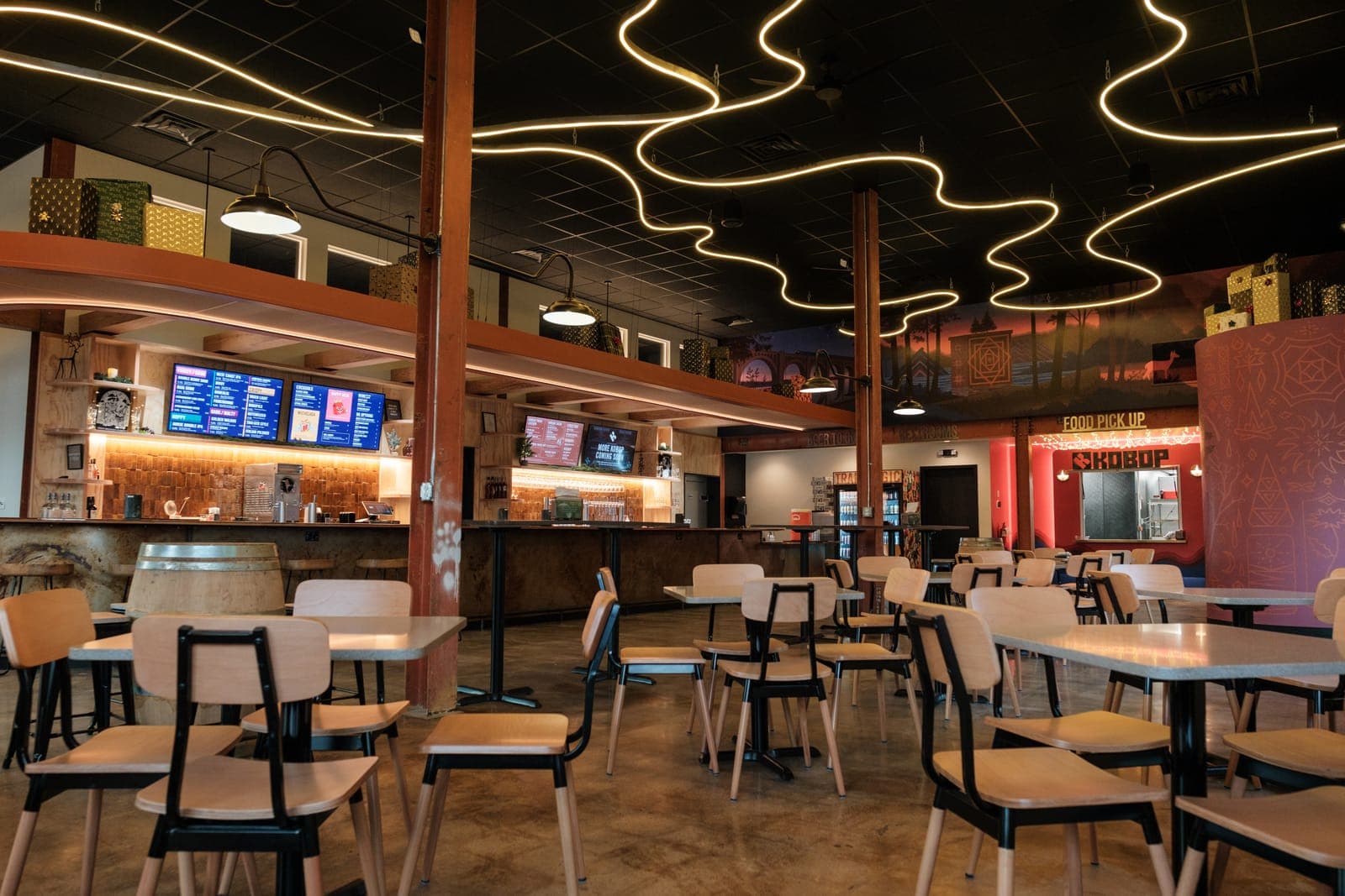 Interior of Kobop at Vasen Brewing with neon ribbon ceiling lights